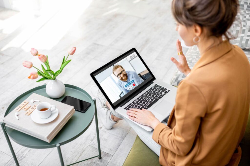 Professional woman having a video call on a laptop
